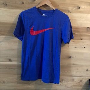 Blue Nike T-shirt with red swish